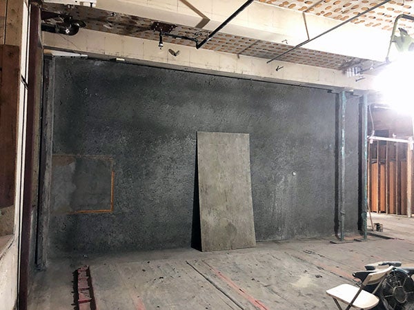 a concrete wall in a building under construction