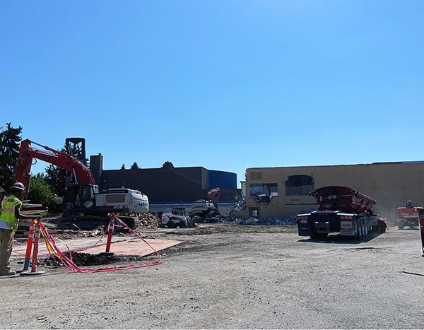 construction equipment in front of a building