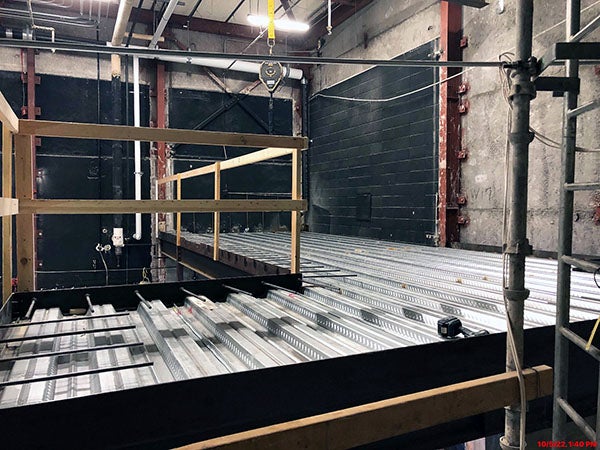 a raised frame has metal where a floor will go
