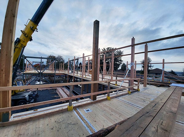 wooden beams and decking of a partially built structure