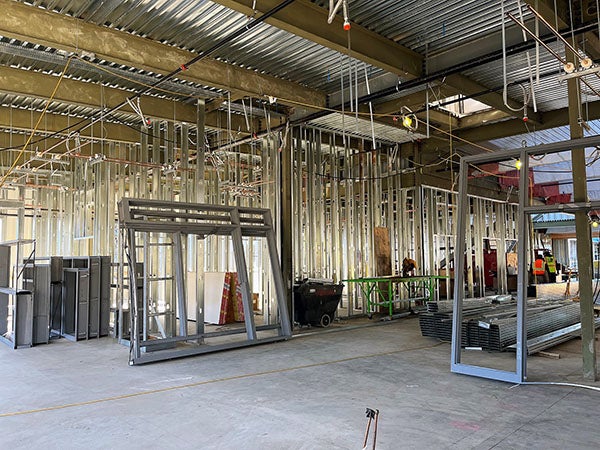 metal wall studs inside a large unfinished building