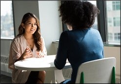 women working in a meeting