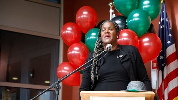 Dr. Keisha Scarlett at a podium