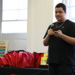 A student gives a speech during the showcase