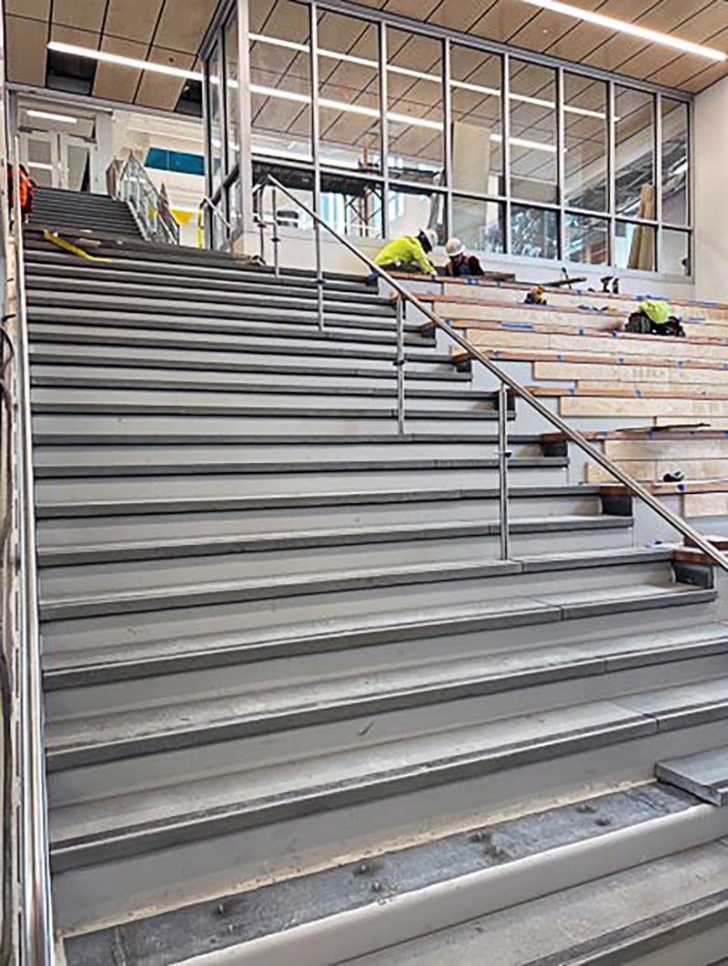 a large concrete stairway inside a building