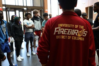 A group of students with tour guide on a DC university campus