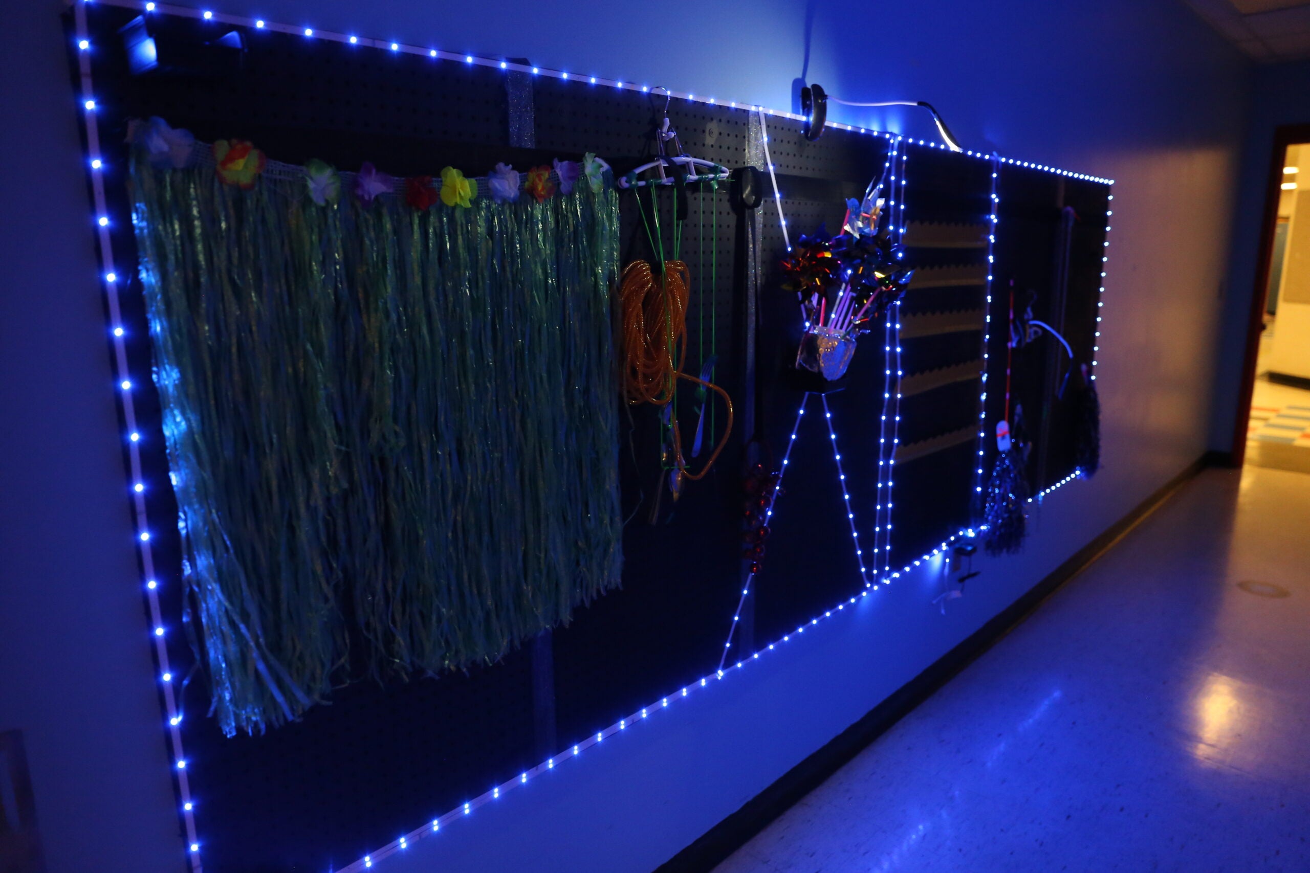 Full view of sensory wall. Blue lights. 