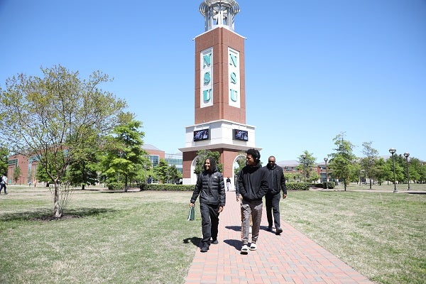 student touring college campus