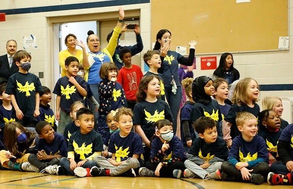 Hawthorne elementary kindergarten students at an assembly where they received bikes