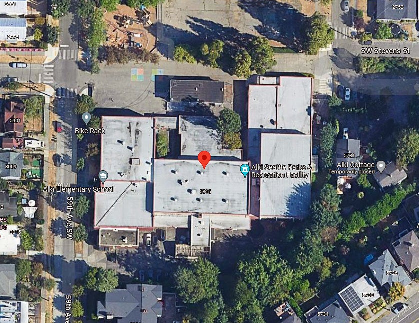 aerial view of a group of connected buildings with Alki Elementary School as the descriptor on the image