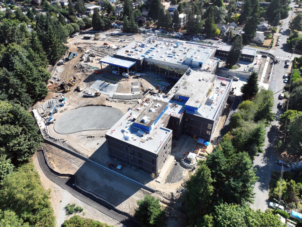 aerial of a large building with construction work happening