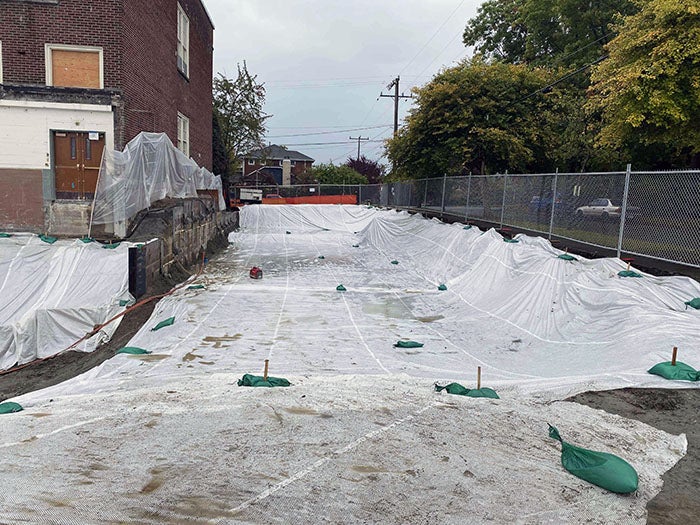 a construction site with material on the ground