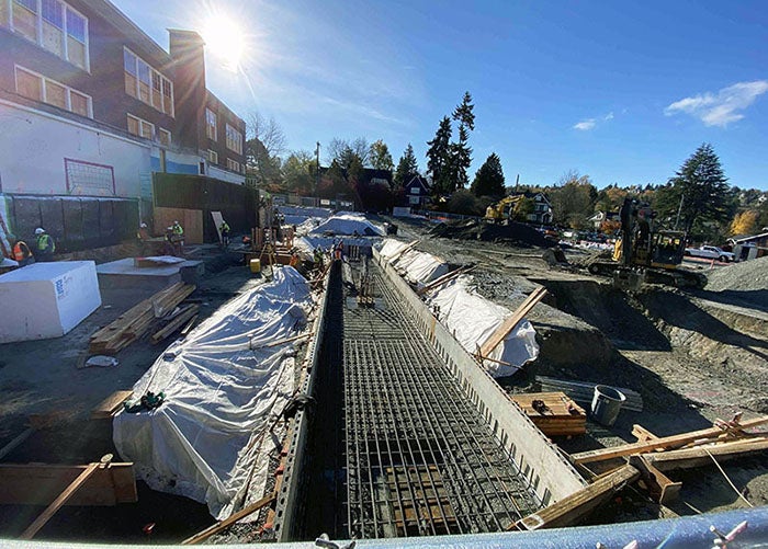 rebar trench next to a brick building