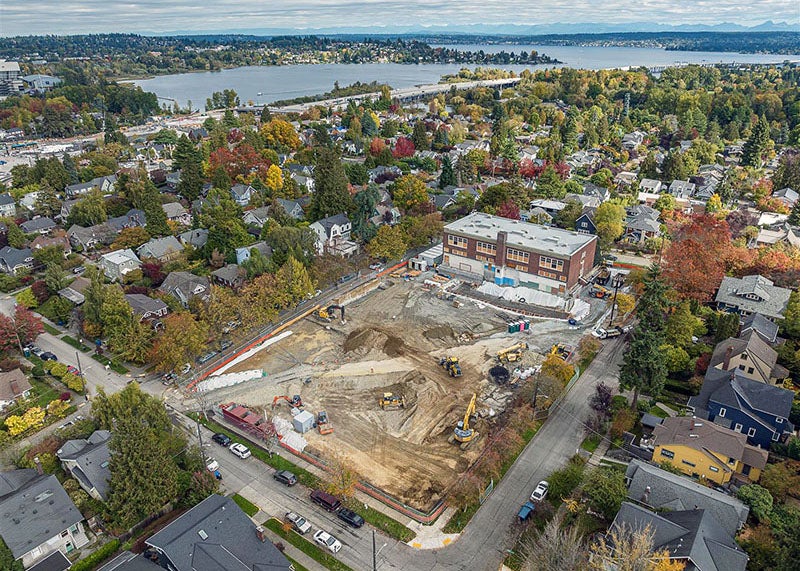 aerial view of a construction site next to a building