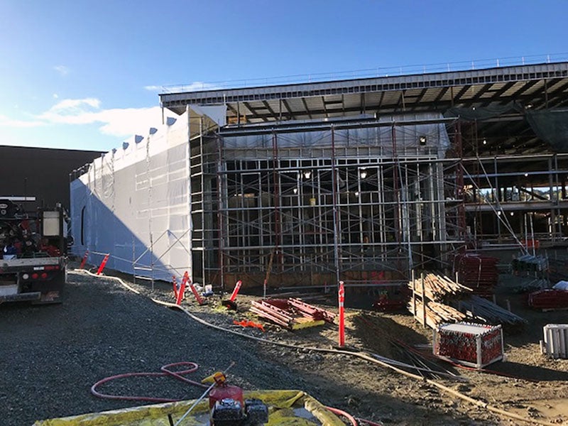 metal framing in progress on a large steel framed building