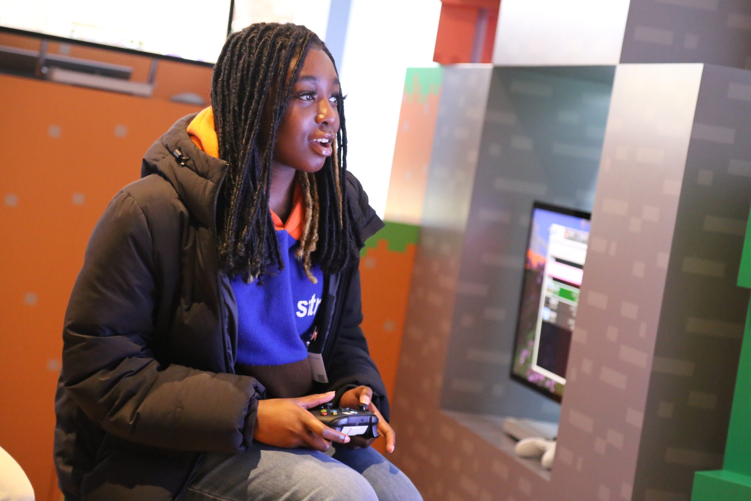 AAMA student plays video game at Microsoft.