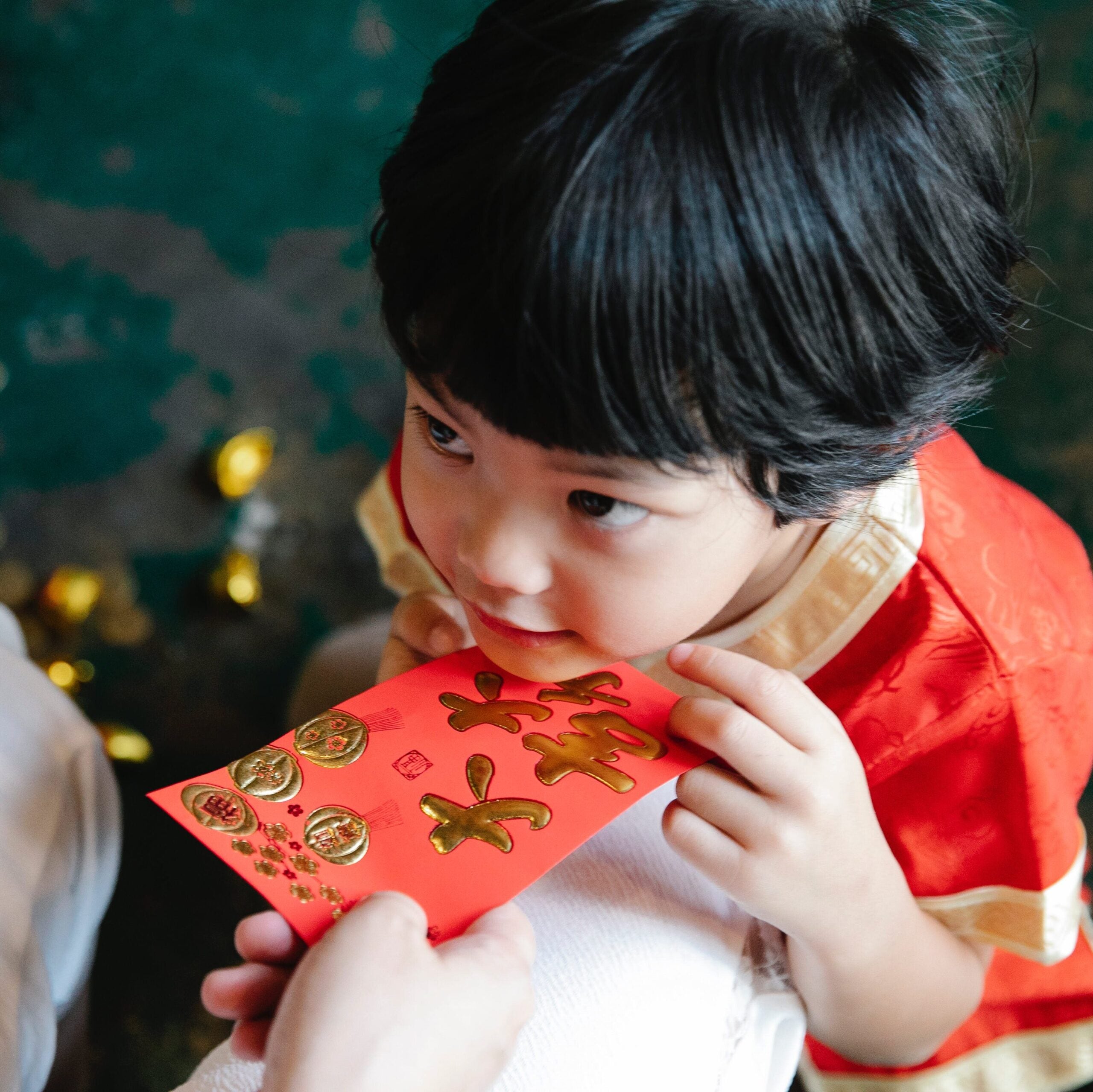 Child with money packet  during celebration