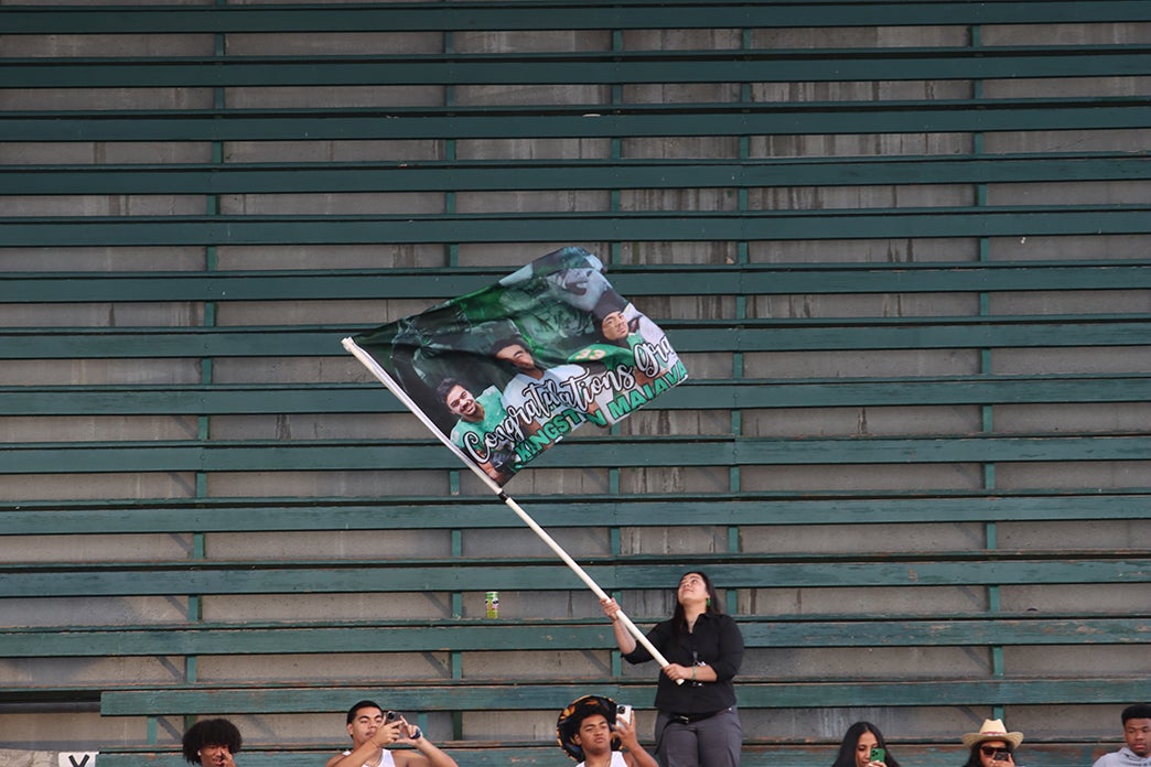 Interagency graduation flag waving