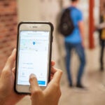 SaferWatch High School a phone that shows the SaferWatch app