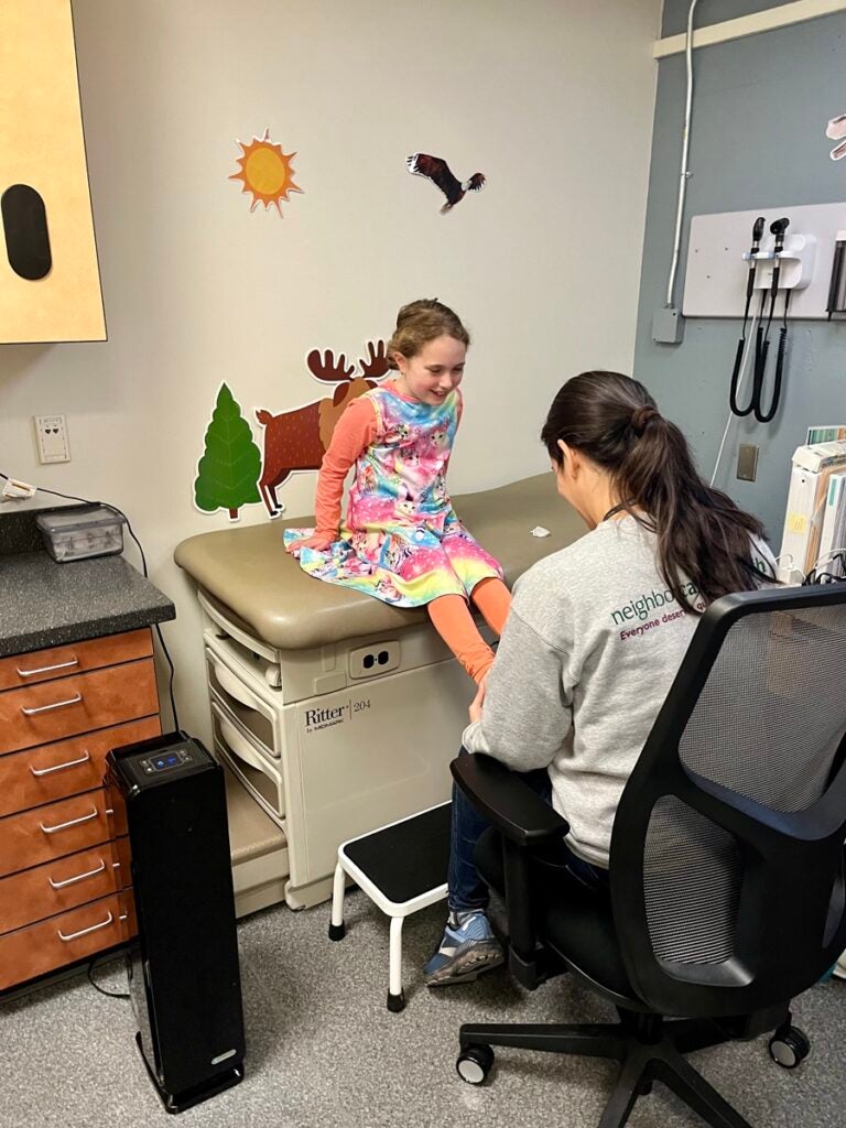 nurse taking care of a student