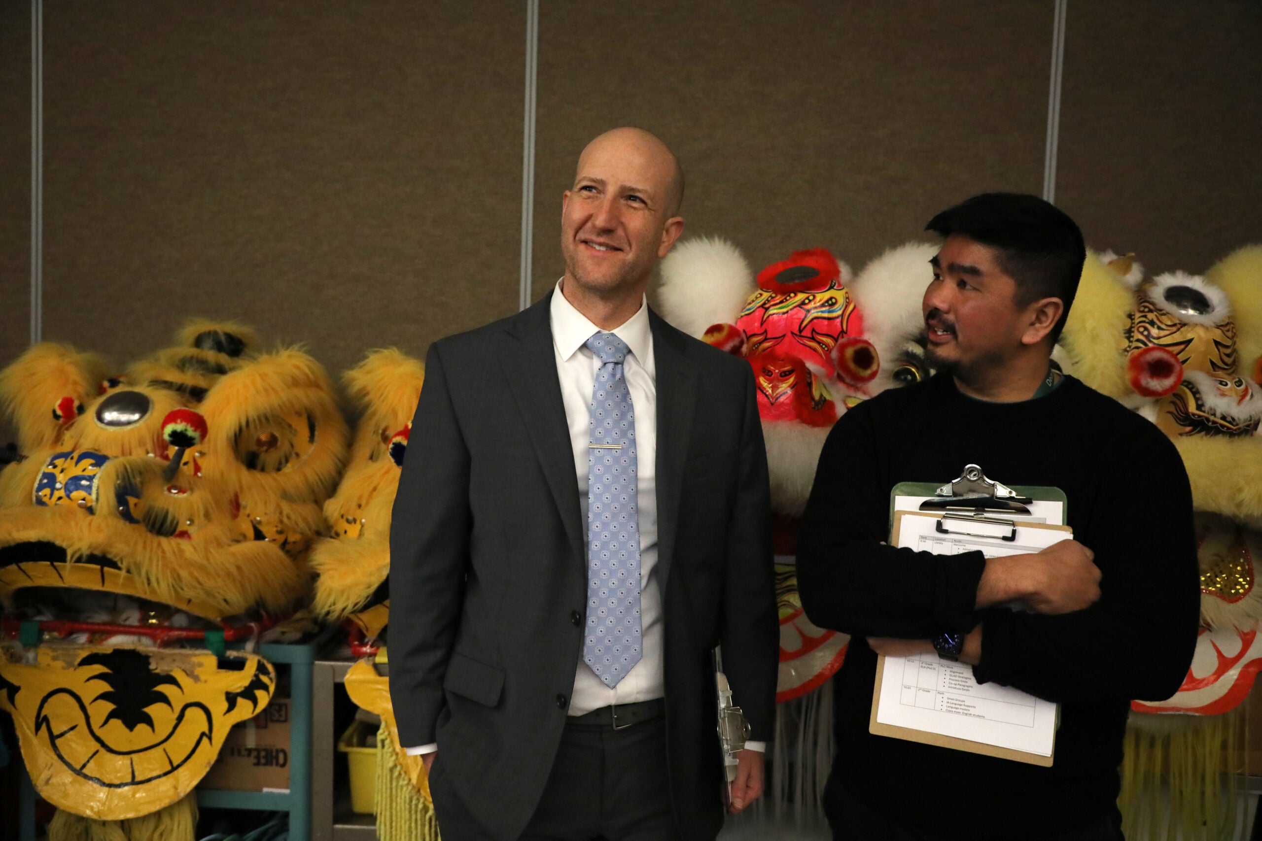 Seattle Public Schools Superintendent Ben Shuldiner talks with Dearborn International Elementary Principal Don Noble during a school tour on February 2, 2026. In his first day as the district's new leader, Shuldiner visited with students and staff before leading the Black History Month flag raising celebration at the John Stanford Center.