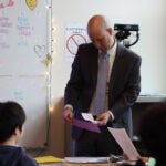 Seattle Public Schools Superintendent Ben Shuldiner visits a Spanish class at Mercer International Middle School on February 2, 2026. On his first day as the district's new leader, Shuldiner spent the day meeting students and staff and raising the Pan-African flag in celebration of Black History Month.