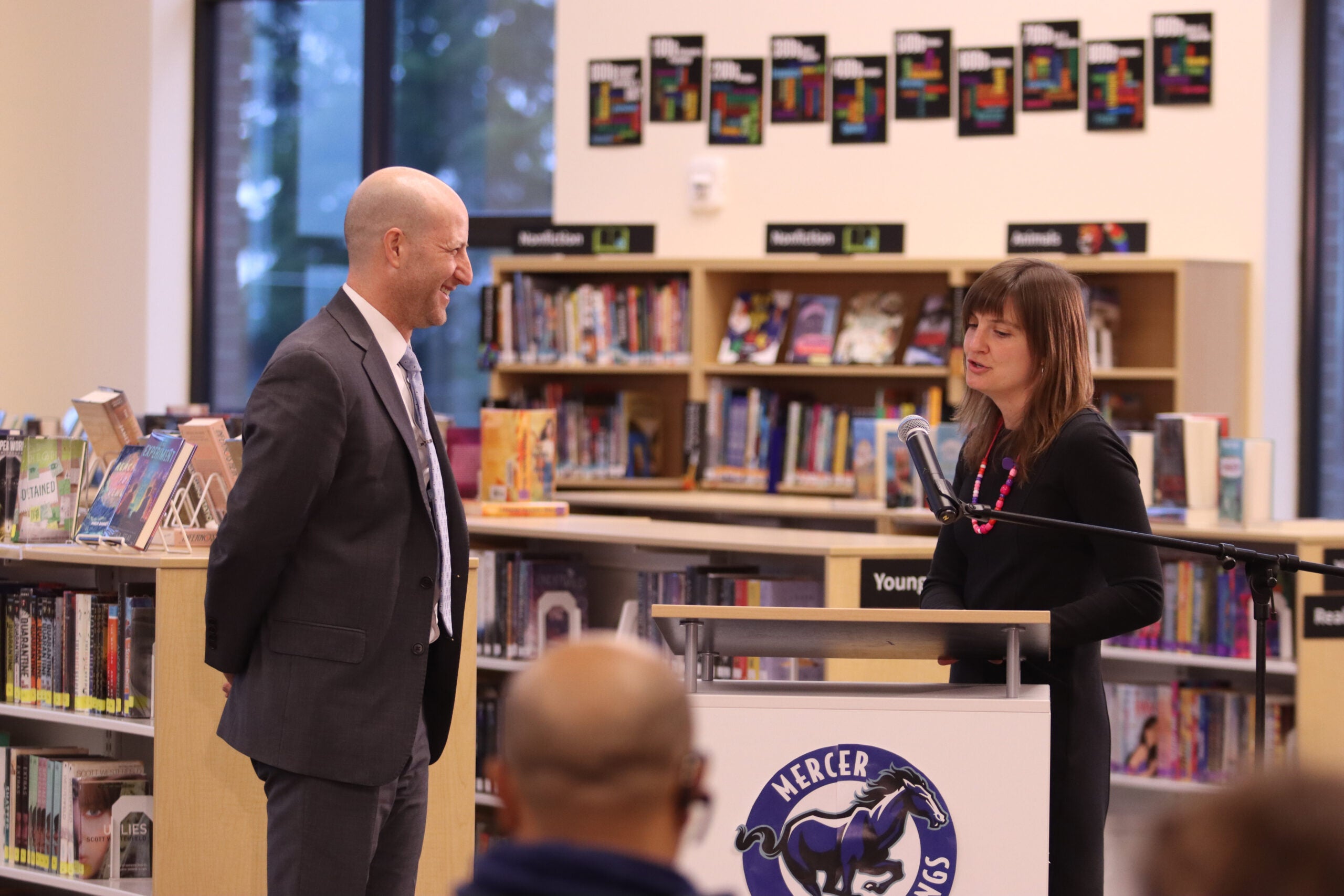 Seattle Public Schools Superintendent Ben Shuldiner takes the Oath of Office with Seattle School Board President Gina Topp at Mercer International Middle School on February 2, 2026. On his second day as the district's new leader, Shuldiner spent the day meeting students and staff and raising the Pan-African flag in celebration of Black History Month.
