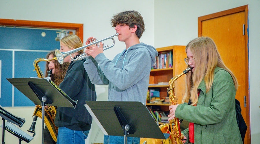 Eckstein Middle School Band performing at Eckstein Middle School March 17, 2026 community meeting