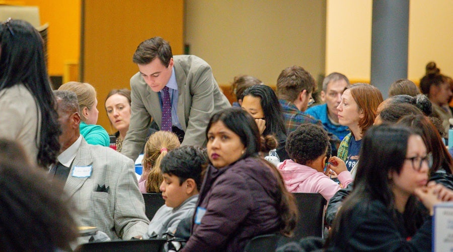 Community members sitting at South Shore Prek-8 School March 3, 2026 community meeting.