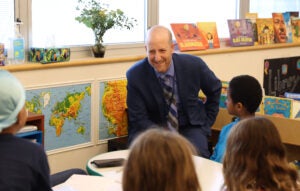 Seattle Public Schools Superintendent Ben Shuldiner sits in on a reading lesson during his tour of South Shore PreK-8 in February. The superintendent is more than halfway through his goal of visiting all 106 schools in the district. He&rsquo;s on track to finish touring schools in early May.