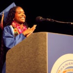 Graduation Rainier Beach Aida speaking in cap and gown