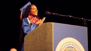 Graduation Rainier Beach Aida speaking in cap and gown