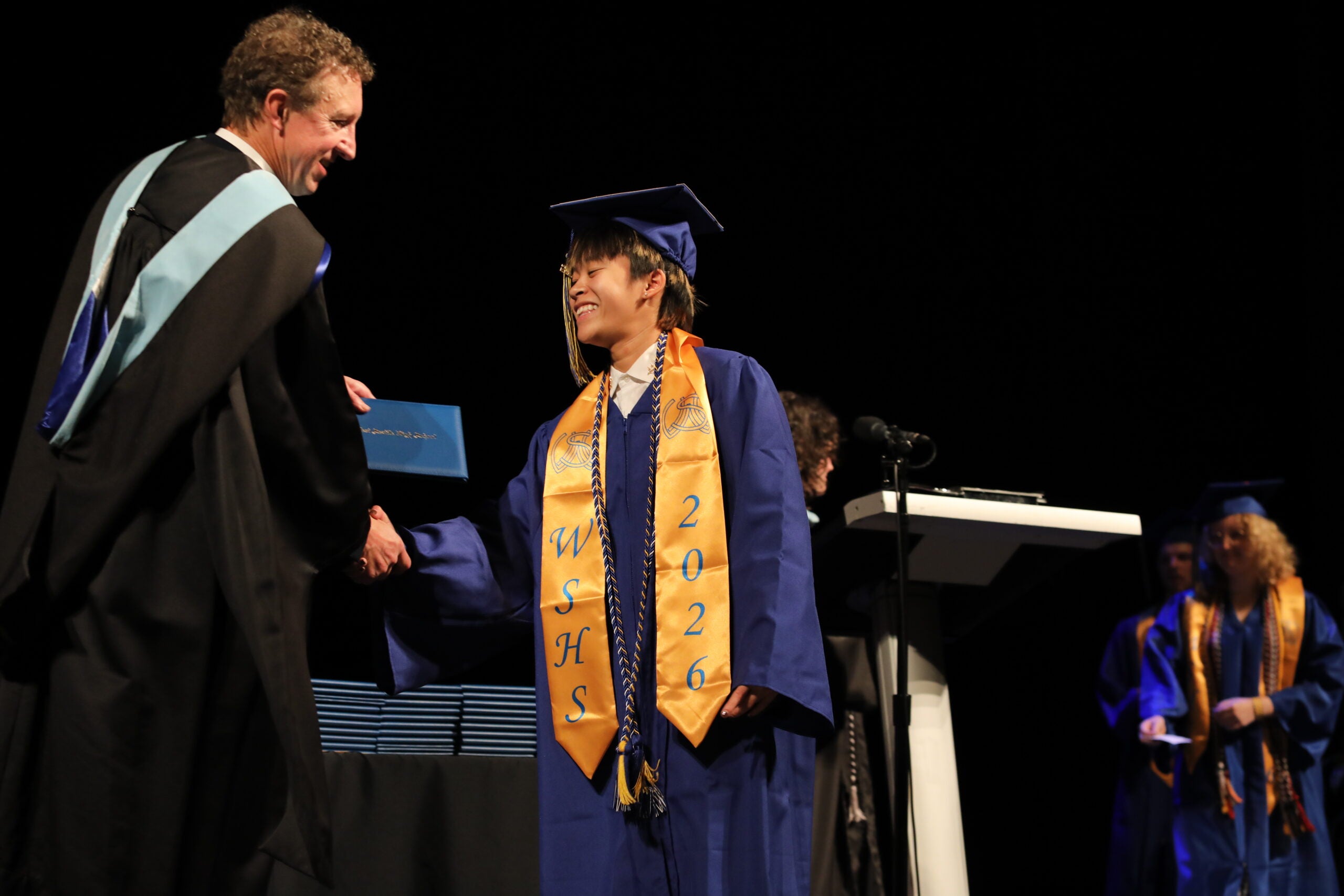 West Seattle Graduation shaking hands