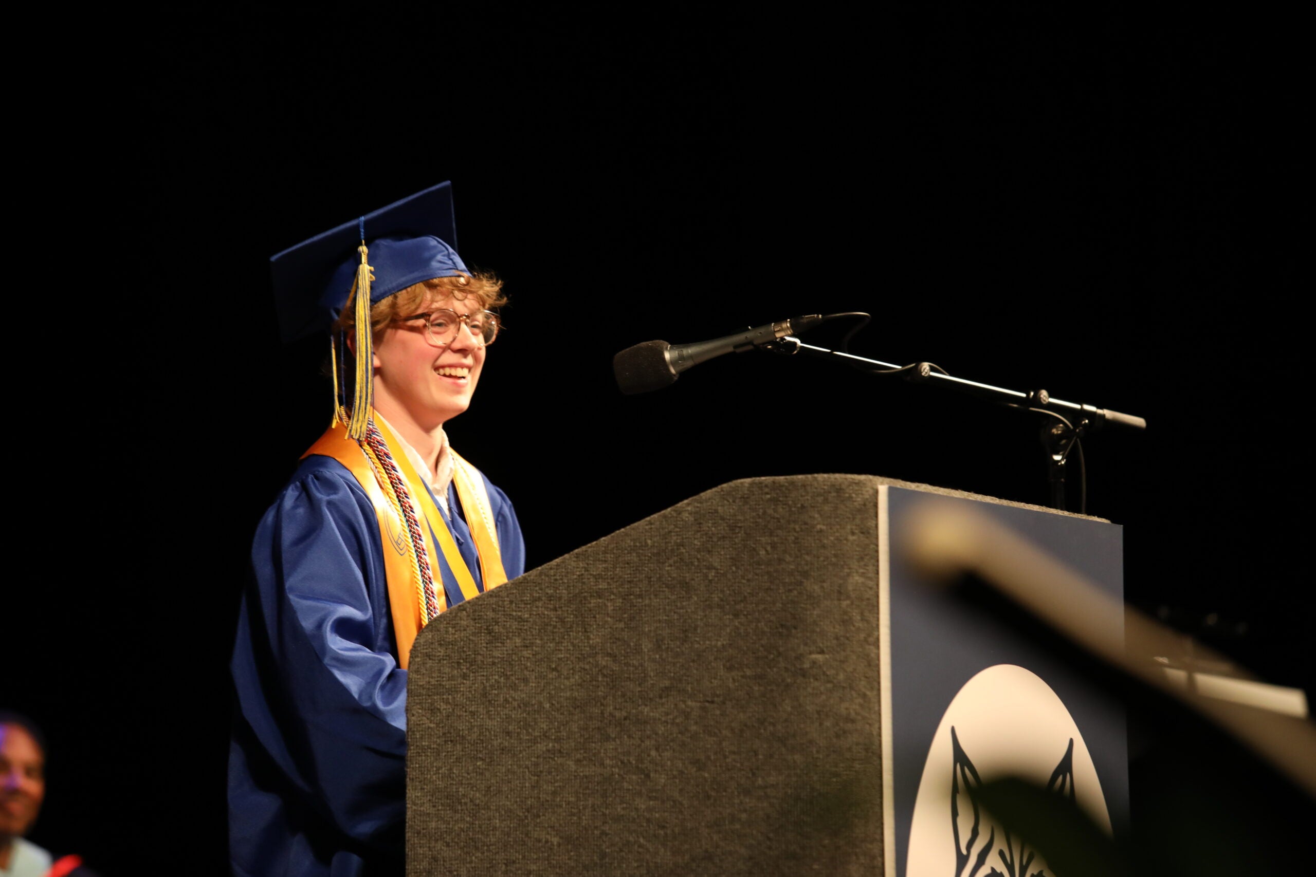 West Seattle Graduation Speaker at podium