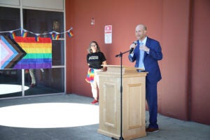 Superintendent Shuldiner speaking at JSCEE Pride Flag Raising