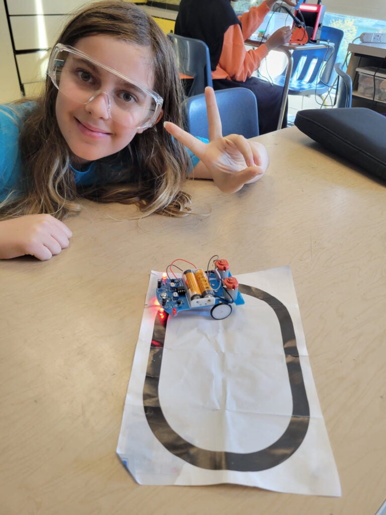 scholars have learned how to safely use a soldering iron, practiced soldering by creating figurines out of electronic components, and started making electronics using soldering kits.