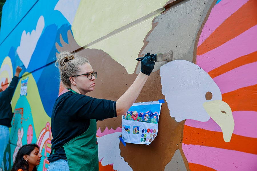 Emerson Close up of an adult painting an eagle