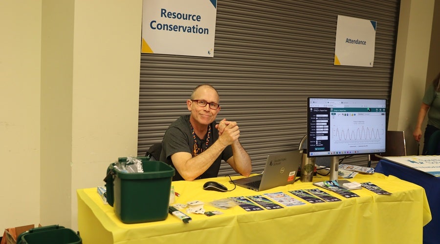 Resource Conservation staff at a table at the January 2026 Enrollment Fair