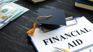 Financial Aid with a graduation cap
