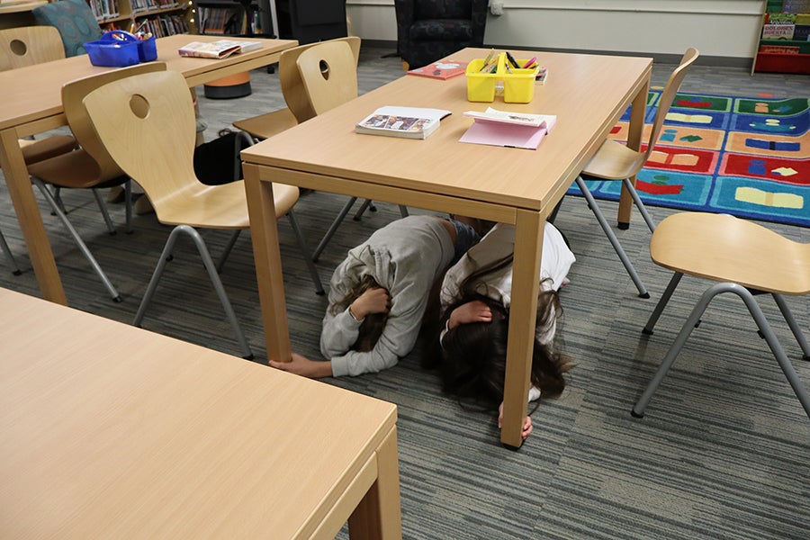 Great ShakeOut students practicing under desk