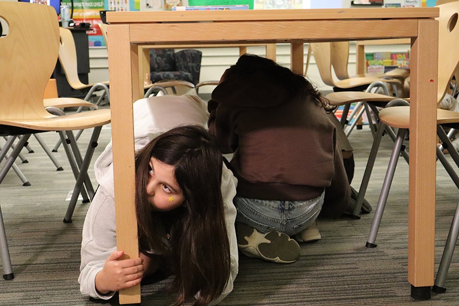 Great ShakeOut students practicing under desk