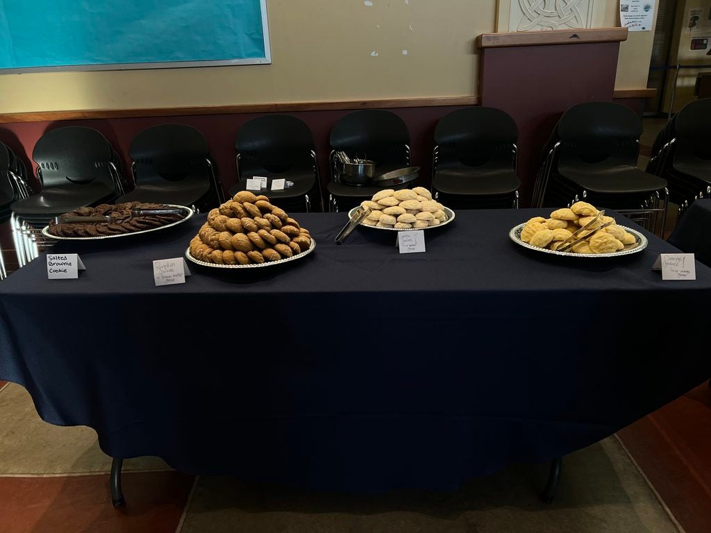 four platters of cookies created by student chefs