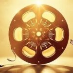 graphic of two figures dancing around a film reel