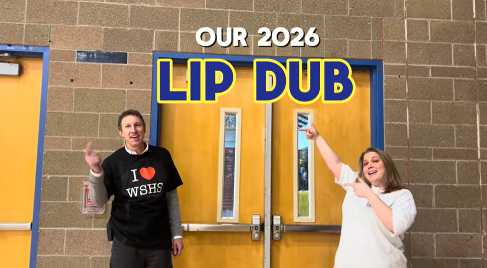 Our Principal and Activities Coordinator welcoming the lip dub. 