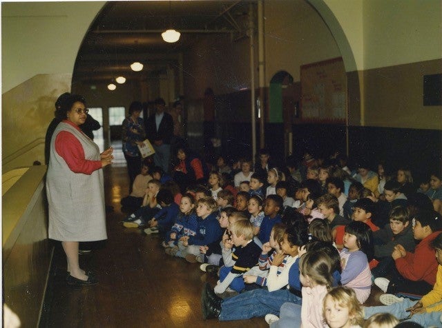 Carole Speaking in front of a crowd