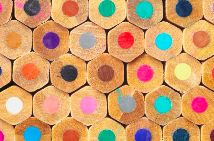 Ends of many colored pencils.