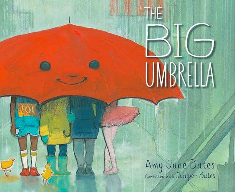 Text: The Big Umbrella. Book Cover with red umbrella and 4 student characters under it. Text: By Amy Jane Bates