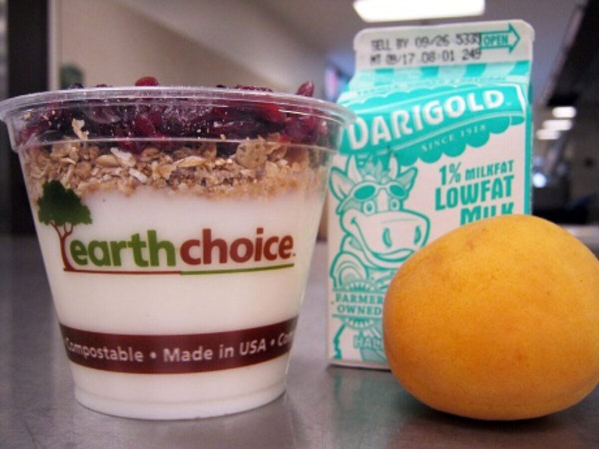 Yogurt, milk and an orange