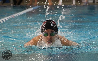 Cleveland swimmer coming up for air during the breaststroke event