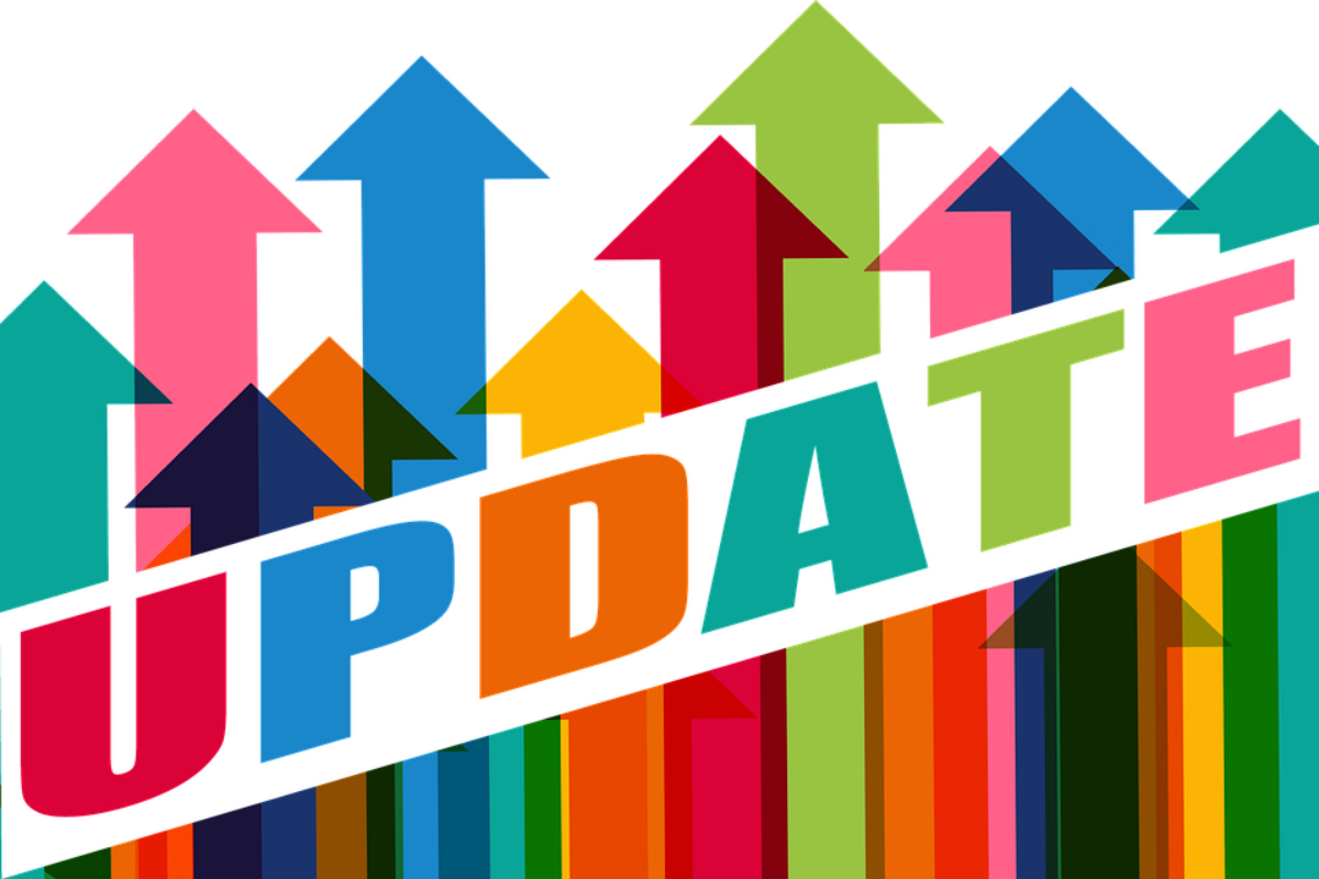 Multiple colorful arrows pointing up with the word Update across them